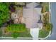 Overhead view of home with patio, firepit and lush, mature landscaping at 2631 Moon Chase Lane, Buford, GA 30519