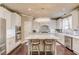 Spacious kitchen with a large island, pendant lighting, and stainless steel appliances at 2631 Moon Chase Lane, Buford, GA 30519