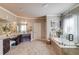 Luxurious main bathroom features granite countertops, a soaking tub, and a frameless glass shower for a spa-like experience at 2631 Moon Chase Lane, Buford, GA 30519