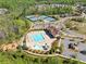 Aerial view showcasing community pool, clubhouse, and neighborhood amenities for residents at 2890 Canter Meadow Dr, Cumming, GA 30040