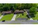 An aerial view displays a well-maintained home with a long driveway and a lush green lawn at 2920 Dara Dr, Marietta, GA 30066