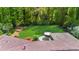 Aerial view of a spacious backyard, featuring a well-maintained lawn and a patio area at 2920 Dara Dr, Marietta, GA 30066