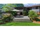 Spacious backyard with a patio, barbecue, and an elevated, screened-in porch at 2920 Dara Dr, Marietta, GA 30066