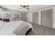 Comfortable bedroom with gray carpet, white bedding, and en-suite bath at 2920 Dara Dr, Marietta, GA 30066