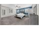 Light-filled bedroom features a queen bed, white walls and trim, and soft carpeting at 2920 Dara Dr, Marietta, GA 30066