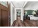 Inviting foyer with hardwood floors, a view of an office space, and a glimpse into the kitchen at 2920 Dara Dr, Marietta, GA 30066