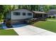 Split-level home boasting a convenient attached garage and a spacious driveway, perfect for multiple vehicles at 2920 Dara Dr, Marietta, GA 30066