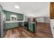 Open kitchen featuring stainless appliances, light countertops, and seamless flow to dining area at 2920 Dara Dr, Marietta, GA 30066