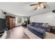 Well lit living room with hardwood floors, ceiling fan, large sectional sofa and ample natural light at 2920 Dara Dr, Marietta, GA 30066