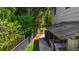 Side yard featuring a walkway along the side of the house with flowers and a fence at 2920 Dara Dr, Marietta, GA 30066