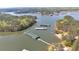 An aerial view of boat storage docks located on a lake surrounded by trees at 5400 Kings Camp Cabin 16 Se Rd, Acworth, GA 30102