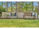 The home's exterior with light siding and blue shutters with a small front porch at 5400 Kings Camp Cabin 16 Se Rd, Acworth, GA 30102
