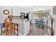Modern kitchen open to dining with stainless steel appliances and breakfast bar seating at 5400 Kings Camp Cabin 16 Se Rd, Acworth, GA 30102