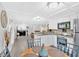 Open-concept kitchen with modern appliances and seamless flow to the living area for entertaining at 5400 Kings Camp Cabin 16 Se Rd, Acworth, GA 30102