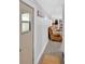 Comfortable living room with a tan leather sofa and wooden floors at 5400 Kings Camp Cabin 16 Se Rd, Acworth, GA 30102
