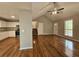 Spacious living room featuring hardwood floors and an open floor plan to the kitchen at 14 Highland Dr, Carrollton, GA 30116