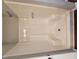Clean, sleek shower features built-in seating, optimizing space and adding comfort at 14 Highland Dr, Carrollton, GA 30116