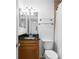 Bathroom featuring modern toilet, granite countertop, and vanity at 1468 Briarwood Ne Rd # 602, Atlanta, GA 30319