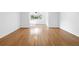 Open-concept living space boasts light hardwood floors and abundant natural light at 1468 Briarwood Ne Rd # 602, Atlanta, GA 30319
