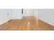 Hardwood flooring shines in this bright living room, with views to the entry and dining area at 1468 Briarwood Ne Rd # 602, Atlanta, GA 30319
