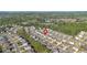An aerial view of a quiet residential neighborhood with lush green landscaping at 4655 Bluffton Ct, Cumming, GA 30028
