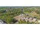 Scenic aerial shot capturing the community's layout with its pool, playground, and lush green surroundings at 4655 Bluffton Ct, Cumming, GA 30028