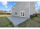 Spacious concrete back patio, ideal for outdoor entertaining and relaxation at 4655 Bluffton Ct, Cumming, GA 30028