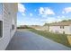 Large concrete patio with expansive lawn perfect for outdoor entertainment at 4655 Bluffton Ct, Cumming, GA 30028