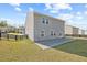 Expansive backyard with concrete patio offering plenty of space for entertaining and relaxation at 4655 Bluffton Ct, Cumming, GA 30028