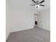 Bedroom featuring neutral carpeting, a ceiling fan, and a versatile color palette at 4655 Bluffton Ct, Cumming, GA 30028