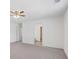 Spacious bedroom with carpet, ceiling fan, and access to the bathroom and walk in closet at 4655 Bluffton Ct, Cumming, GA 30028