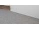Bright, neutral carpet compliments the paint for a modern interior aesthetic at 4655 Bluffton Ct, Cumming, GA 30028