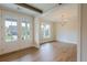 Elegant dining room with wood floors and a stylish chandelier at 5325 Keepsake Court, Cumming, GA 30040