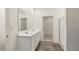 Bathroom featuring double sinks, tile flooring, and a separate shower at 600 Silver Moon Dr, Loganville, GA 30052