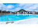 Community pool with a clubhouse, a lifeguard stand, and fenced-in area at 600 Silver Moon Dr, Loganville, GA 30052