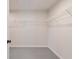 This walk-in closet features wire shelving to maximize storage and organization at 7515 Woolf Way, Cumming, GA 30028