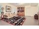 Finished basement with a comfortable seating area, wooden built-ins, and stylish decor, great for relaxing at 1872 Lake Lucerne Sw Dr, Lilburn, GA 30047