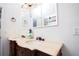 Bathroom with double sinks, framed mirrors, and marble countertop at 4080 Birch Bark Way, Douglasville, GA 30135
