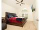 Spacious bedroom with vaulted ceiling, large bed, and wall-mounted TV at 4080 Birch Bark Way, Douglasville, GA 30135