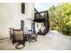 Relaxing outdoor patio area with a table and chairs, perfect for entertaining guests at 4080 Birch Bark Way, Douglasville, GA 30135