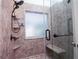 New shower with glass door, adjustable showerhead, and built-in seat at 4080 Birch Bark Way, Douglasville, GA 30135