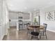 Spacious kitchen featuring stainless steel appliances, granite countertops, and white cabinets at 545 Paces Dr, Lithia Springs, GA 30122