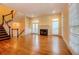 Bright living room features hardwood floors, fireplace, and built-in shelving perfect for entertaining at 774 Piedmont Ne Ave # 11B, Atlanta, GA 30308