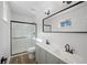 Bathroom features a modern vanity and glass shower at 1024 Herndon Nw St, Atlanta, GA 30318