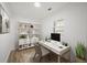 Well-lit home office featuring a modern desk, stylish shelving, and a comfortable chair at 1024 Herndon Nw St, Atlanta, GA 30318