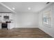 Bright open living space showcasing contemporary finishes and natural light from large windows at 1024 Herndon Nw St, Atlanta, GA 30318
