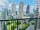 Incredible skyline view from balcony, capturing the city's architectural beauty and vibrant atmosphere at 1080 Peachtree Ne St # 2416, Atlanta, GA 30309