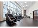 Well-equipped gym with modern cardio machines and ample natural light, promoting a healthy lifestyle at 1080 Peachtree Ne St # 2416, Atlanta, GA 30309
