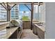 Built-in outdoor grill and sink area, ideal for outdoor cooking and entertaining with city views at 1080 Peachtree Ne St # 2416, Atlanta, GA 30309