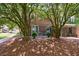 Backyard with beautiful mature trees offering shade and privacy at 12 Valley Forge Nw Pl # 215, Atlanta, GA 30318